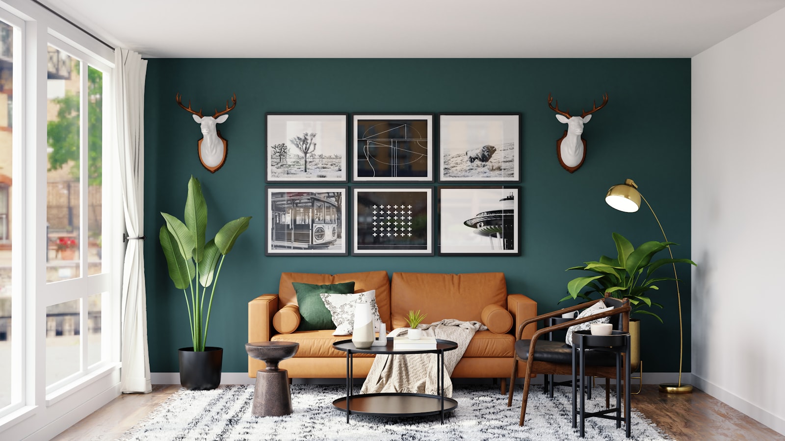Finished living room with deep green wall and leather sofa